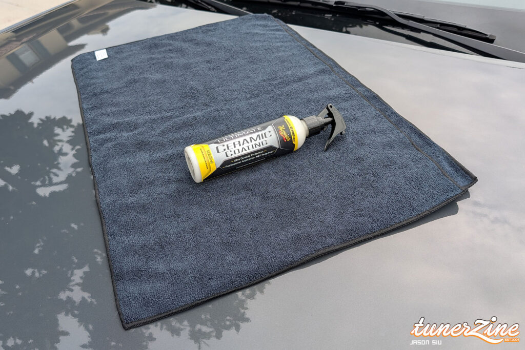 Water beading on the test car's hood after a coat of Meguiar's Ultimate Ceramic Coating | Image: Jason Siu / Tunerzine