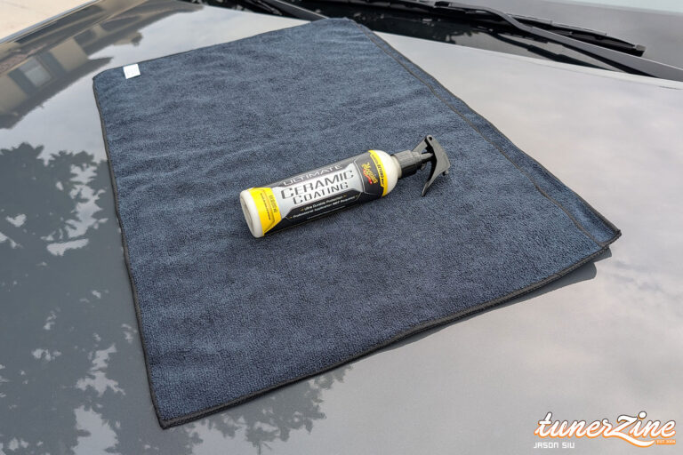 Water beading on the test car's hood after a coat of Meguiar's Ultimate Ceramic Coating | Image: Jason Siu / Tunerzine