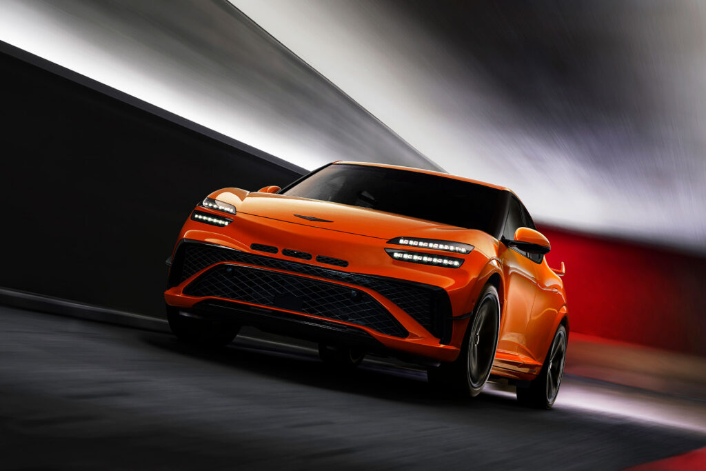 The 2027 GV60 Magma in signature Magma Orange with 21-inch forged wheels | Image: Genesis