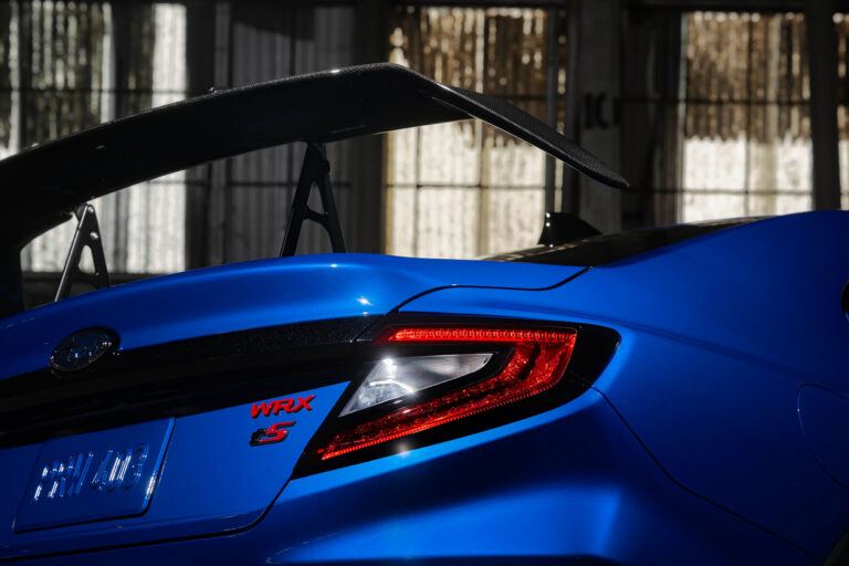 The rear of the 2027 WRX from Subaru's teaser, showing the tS badge and rear wing | Image: Subaru